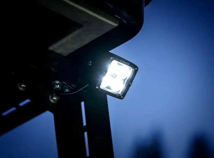 Close-up of a Type S Terra Pro 2 Inch Spot Light mounted to vehicle and turned on